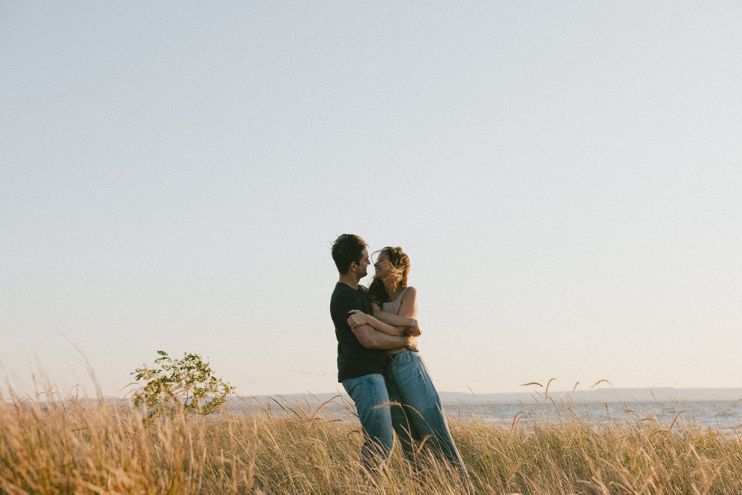 Golden Hour Wasaga Beach Engagement Session | Playful & Candid Photography